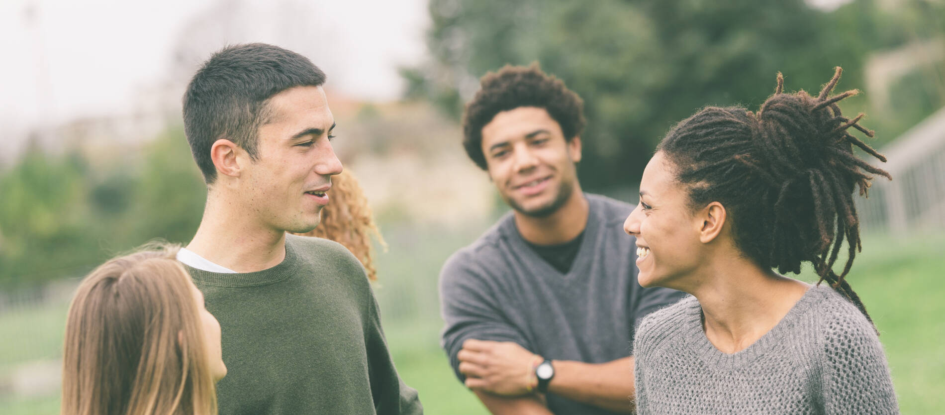 Multiethnic Group of Friends at Park.