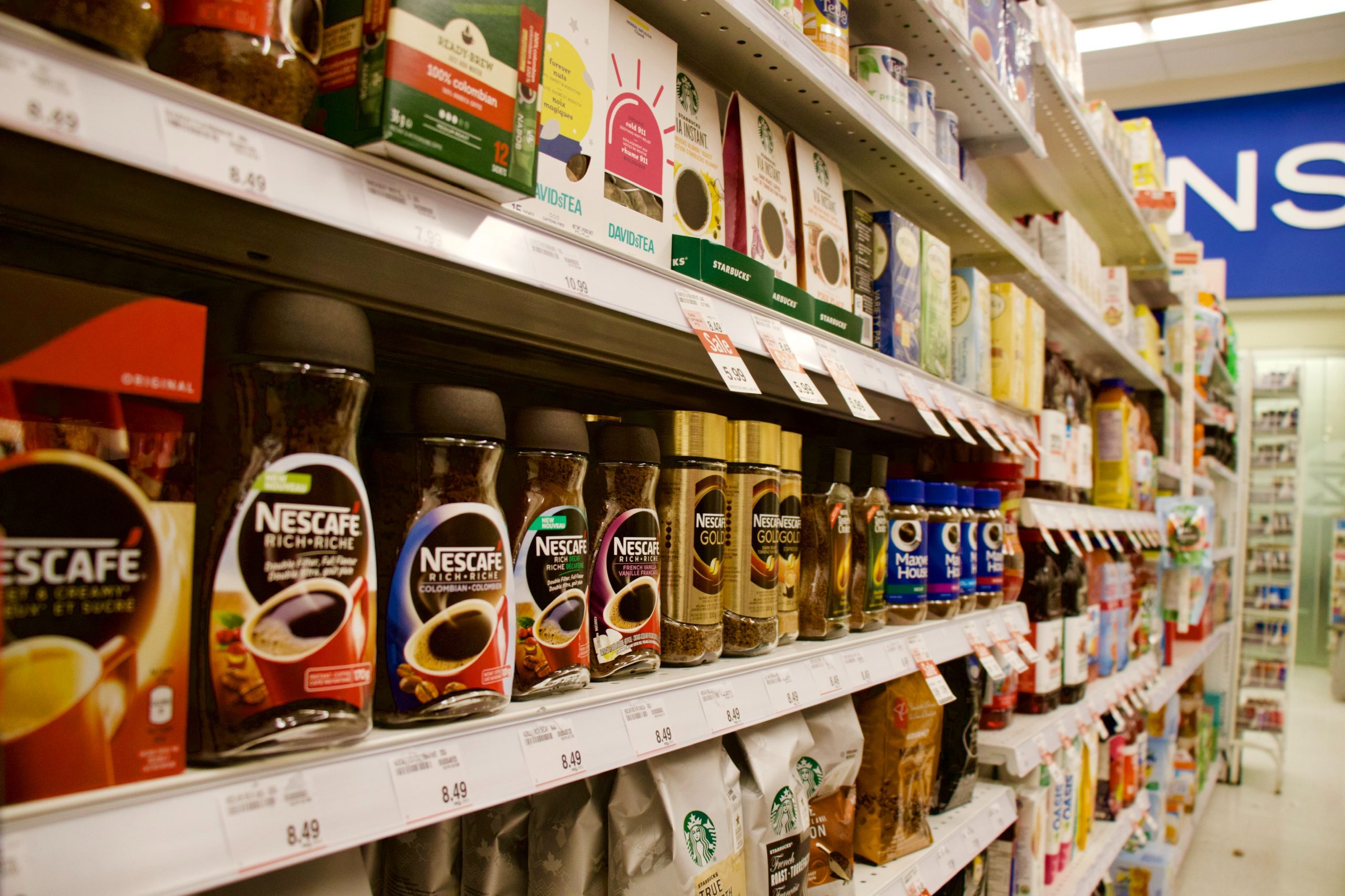 Supermarket shelves filled with products.